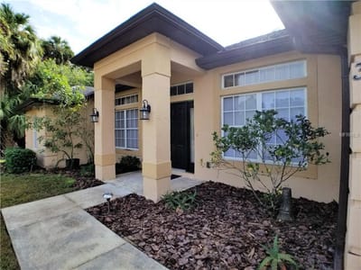 Exterior view of the facility entrance with landscaping