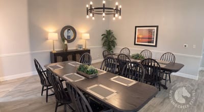 Dining room with large table and elegant decor