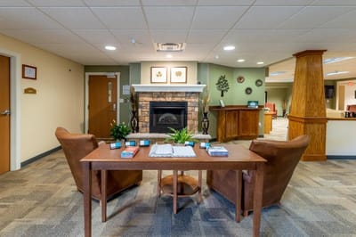 Cozy common area with a fireplace and seating