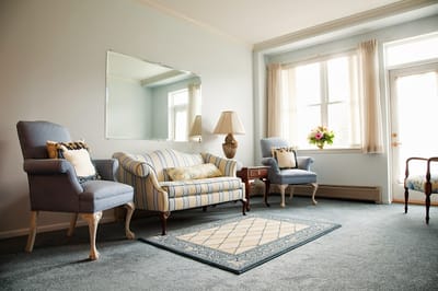 Cozy common area with seating and natural light