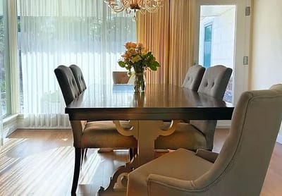 Interior dining area with a table and flowers