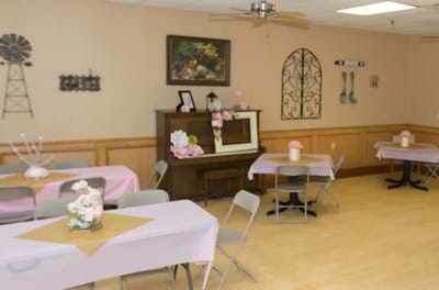 Interior view of a common area with decorated tables