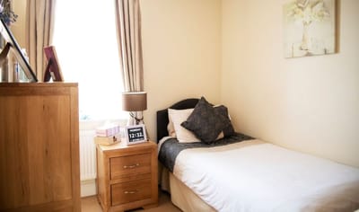 Cozy private resident room with comfortable bed