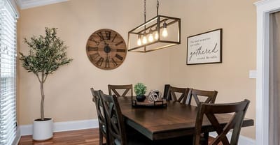 Interior dining area with a large wooden table