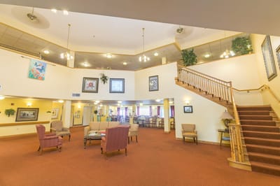Bright interior common area with seating and stairs