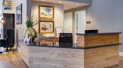 Reception area of a senior care facility with wooden counter