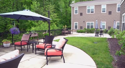 Outdoor seating area with a garden view