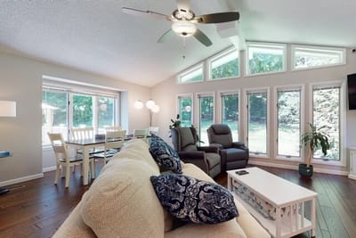 Cozy common area with large windows and comfortable seating