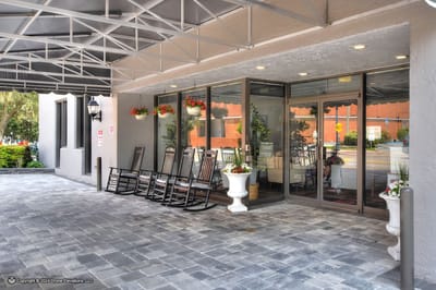 Entrance area with rocking chairs and flower pots