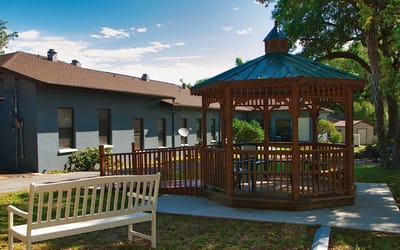A gazebo in the garden area of the assisted living facility