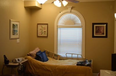 Private resident room with a bed and decor