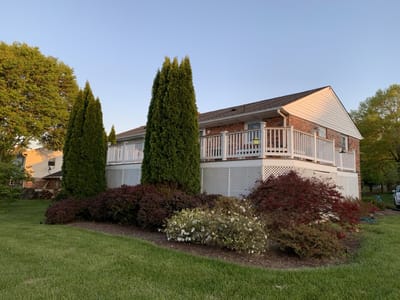 Exterior view of a nursing home surrounded by greenery