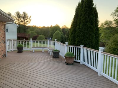 Spacious outdoor deck with potted plants