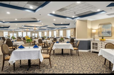 Spacious dining room with neatly set tables
