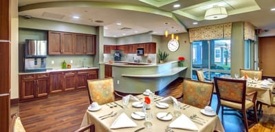 Bright dining room with neatly set tables and modern decor