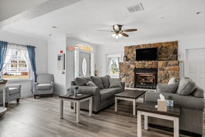 Cozy common area with comfortable seating and fireplace