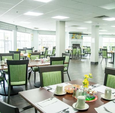 Bright dining area with tables set for meals