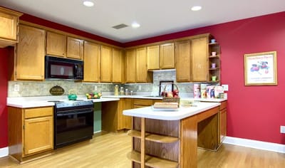 Modern kitchen with wooden cabinets and bright decor