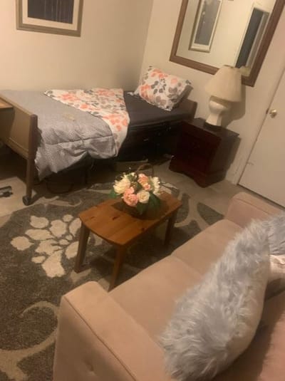 Cozy interior of a resident room with floral decor