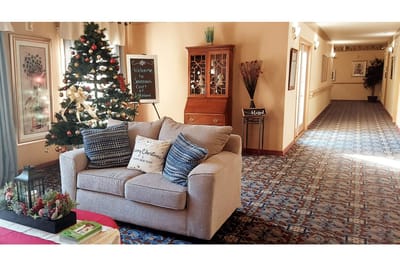 Cozy interior of Savannah Court decorated for Christmas