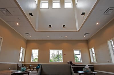 Interior view of a common area with high ceilings