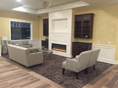 Common area with seating and fireplace