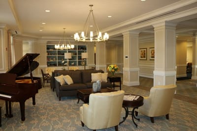 Interior common area with seating and piano