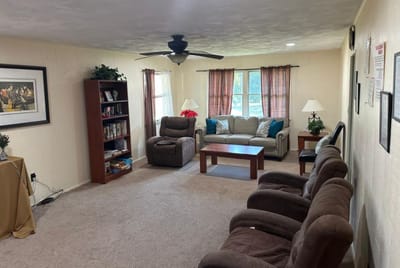 Warm and inviting common area with seating