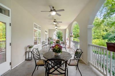 Outdoor patio area with tables and chairs