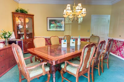 Beautiful dining room with wooden table and chairs