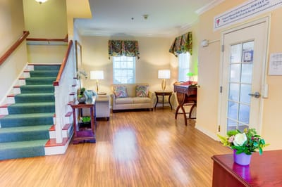 Bright interior common area with seating and decor