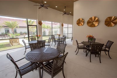 Outdoor dining area with tables and decorations