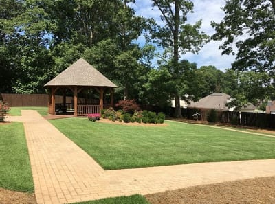 Well-maintained garden area with gazebo