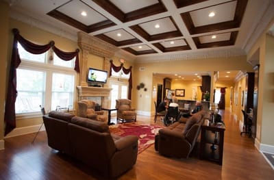 Common area in a senior living facility with residents relaxing