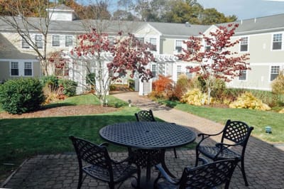 Outdoor seating area with landscaped garden