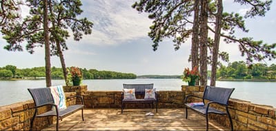 Scenic outdoor seating area by a lake