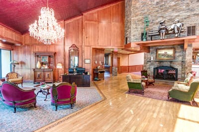 Elegant interior of a common area with seating and chandelier