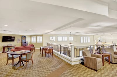 Bright interior common area with couches and tables