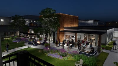 Residents and staff enjoying an outdoor gathering event at night