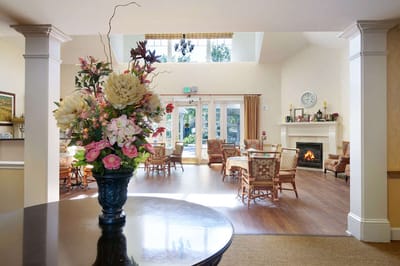 Bright interior common area with floral arrangement