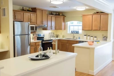 Bright kitchen area with modern appliances