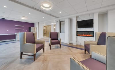 Interior common area with seating and fireplace