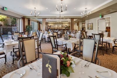 Dining room setup with elegant decor and table settings