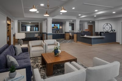 Interior view of a bright common area with seating