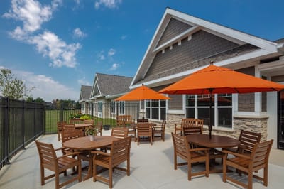 Outdoor seating area with orange umbrellas
