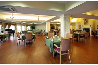 Dining area with tables set for residents