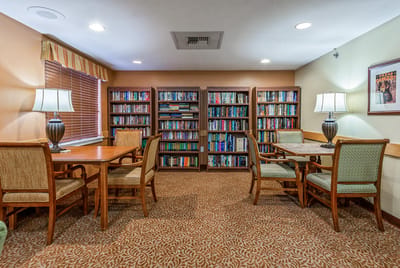 Interior common area with bookshelves and tables