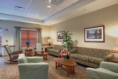 Interior common area with seating and floral arrangements