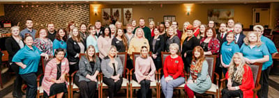 Staff group photo in a common area