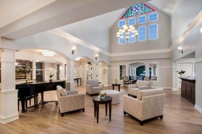 Interior common area with seating and piano